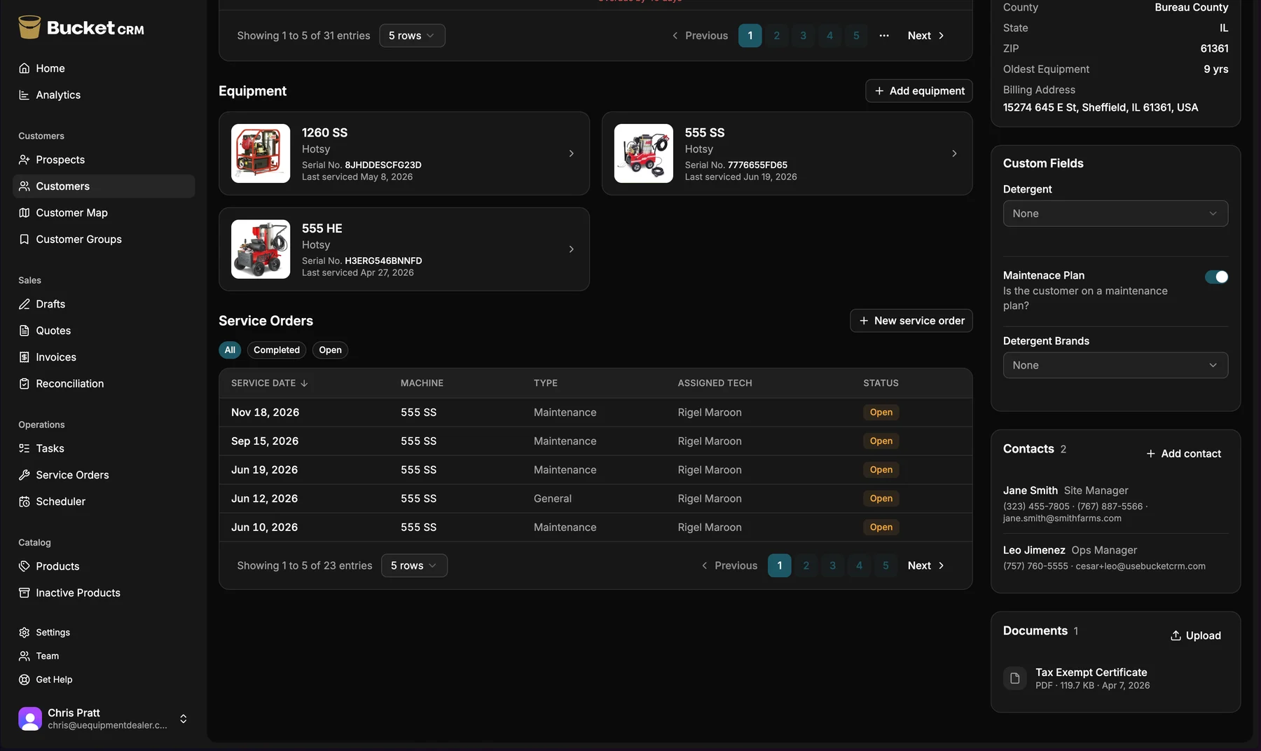 An equipment-dealer customer record in Bucket — contact details alongside the customer's machines, model and serial numbers, and full service history.